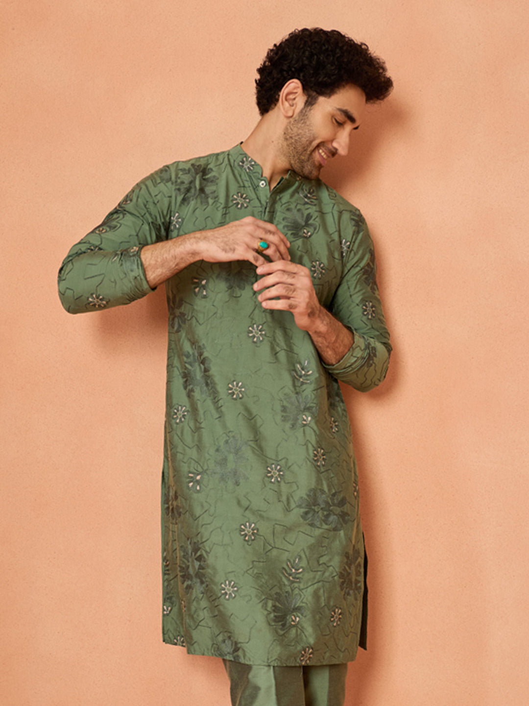 The zoomed in view of Kisah's Green Floral Embroidered Kurta Set is focused