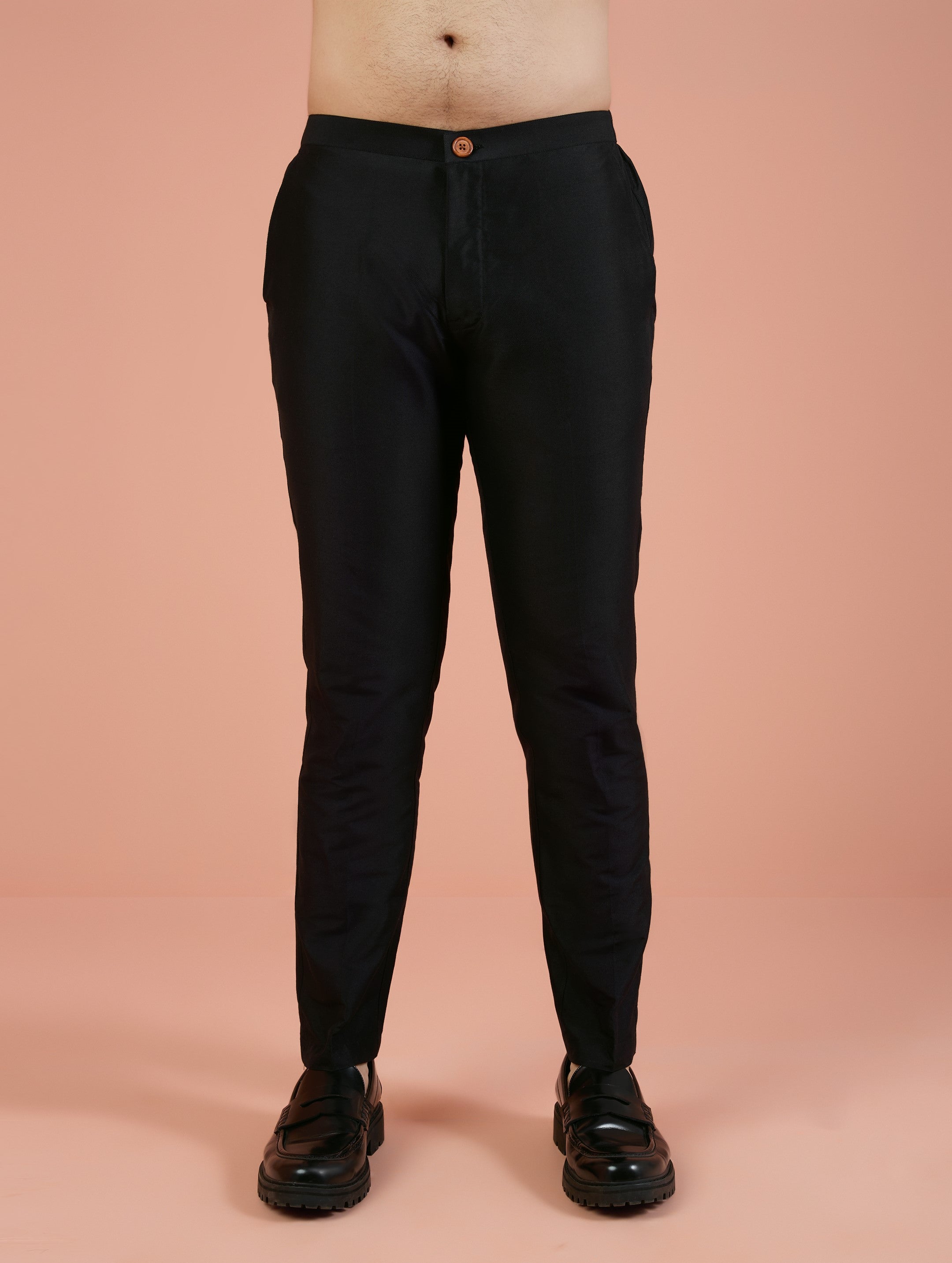 The black trouser, matching with Black Metallic Embroidered Kurta Set is in the image